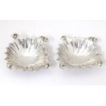 A pair of Victorian silver salts / butter shells, hallmarked Birmingham 1890, maker Nathan &