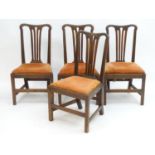 Four mahogany Chippendale side chairs with shaped top rails and pierced fanned back splats above