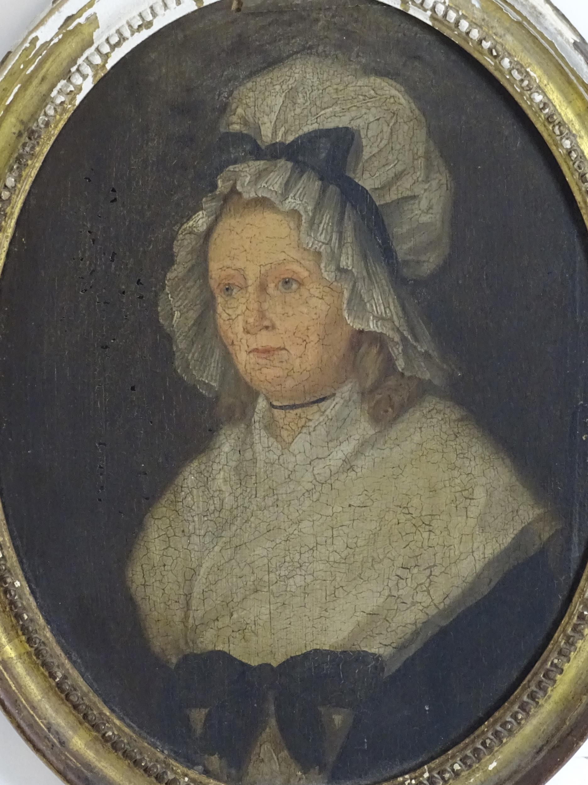 19th century, English School, Oil on paper laid on oval panel, A portrait of a woman wearing a - Image 3 of 3