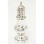 A Geo III silver sugar caster hallmarked London 1767 Approx 5 1/2" high Please Note - we do not make