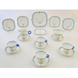 A quantity of Art Deco tea wares comprising 4 tea cups and saucers, a milk jug, sugar bowl,
