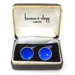 Scandinavian jewellery : A pair of Norwegian silver cufflinks with blue guilloche enamel decoration.