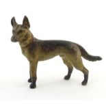 A cold painted bronze model of a dog, possibly an Alsatian / German Shepherd. Approx. 2" long Please