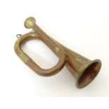 Militaria: a novelty miniature Army bugle, of copper and brass construction with single twist, 5 1/