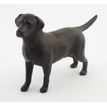 A Beswick matte model of a black labrador dog, model no. 1458. Marked under. Approx. 5 1/2" high