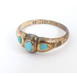 A 9ct gold ring set with graduated turquoise cabochons. Ring size approx. O Please Note - we do