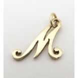 A 9ct gold pendant charm formed as the letter ' M '. Approx 1/2" long Please Note - we do not make