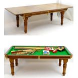A mid 20thC B . 'Hawkes & Son' billiards / dining table measuring 6ft 6 ins. Having a lifting