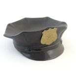 A novelty ceramic bowl / dish modelled as a Police officer's hat with badge to front. Approx. 4 1/2"