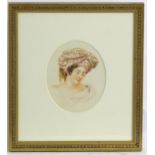 Early 20th century, Watercolour, A portrait of a lady wearing a headdress. Approx. 5 1/4" x 4 1/4"