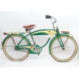 A vintage Columbia Built Five Star Cruiser bicycle with a green frame and cream details, front