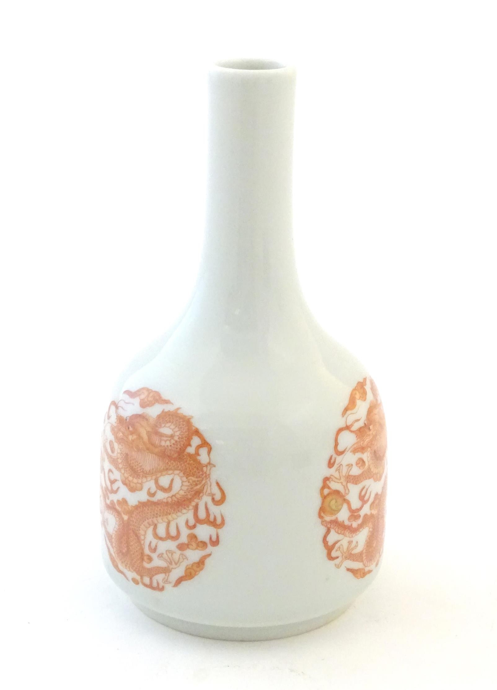 A Chinese bottle vase decorated with dragons and the flaming pearl amongst stylised clouds. - Image 4 of 6