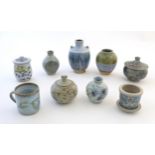 Nine studio pottery items by Eeles Pottery of Dorset, to include, vases, mugs, pot and covers,