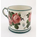 A large Wemyss Ware tyg in the cabbage rose pattern. Impressed marks under. Approx. 9 1/4" high