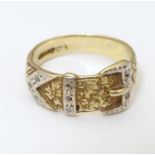 A 9ct gold ring of buckle form set with chipset diamonds. Ring size approx R Please Note - we do not