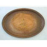 An Arts & Crafts copper tray of oval form with ship decoration to centre by Hugh Wallis. Stamped