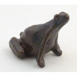 A bronze model of a stylised seated frog. Signed with initials W. R. L. under. Approx. 1 7/8" high