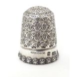 A Victorian silver thimble hallmarked Chester 1896, maker Charles Horner Please Note - we do not