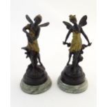 Two 20thC cast models of female fairies after Auguste Moreau, with cast signature to reverse, one