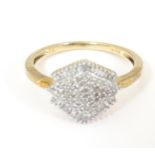 A 19ct gold ring set with diamond cluster. Ring size approx. V Please Note - we do not make