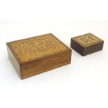 A late 19th / early 20thC Continental marquetry jewellery box with scrolling floral and foliate