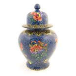A Losol Ware lidded jar / vase of baluster form decorated in the magnolia flower pattern. Marked