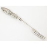A Victorian silver pickle fork hallmarked Birmingham 1868, maker George Unite, with silver handle