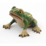 A cold painted bronze model of a seated frog. Approx. 7/8" high Please Note - we do not make