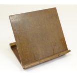 An early 20thC oak adjustable table top book stand / rest. Approx. 9 1/2" high x 12" wide x 11 1/