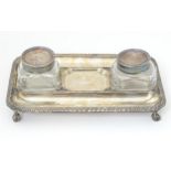 A 19thC silver plate inkstand / standish with two glass bottles. The whole 9 3/4" wide Please Note -
