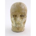 An artist's sculpture / glazed ceramic model of a human head. Approx. 8 1/4" high Please Note - we