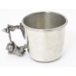 A silver plate Christening mug with bear decoration to handle by Alchemy Pewter. Approx. 2 1/4" high