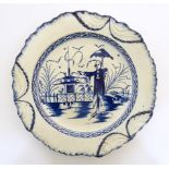 A blue and white pearlware plate decorated in the Long Eliza pattern, depicting a Chinoiserie