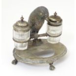 Kitchenalia: a Victorian novelty figural silver plated cruet set, the oval base stamped with