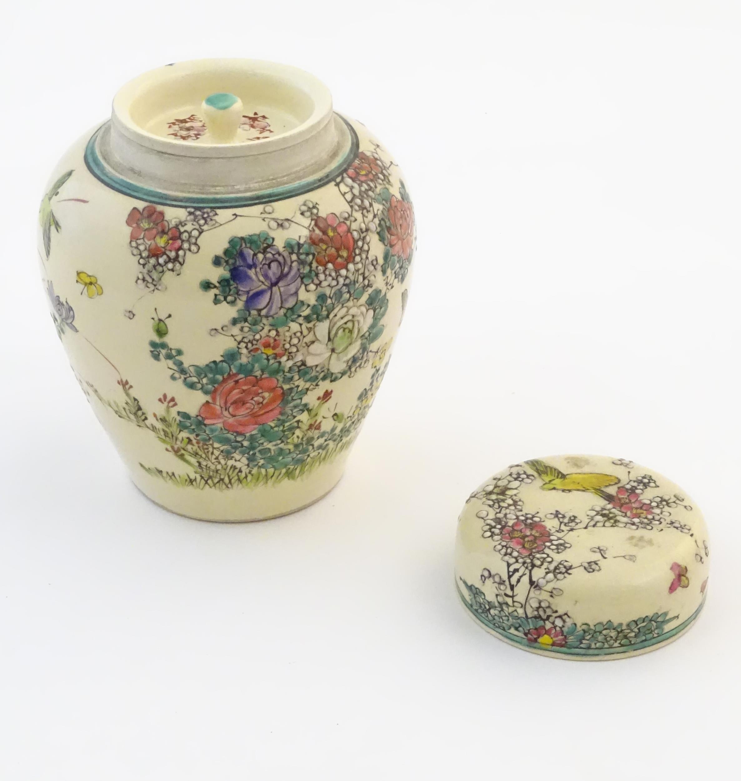 An Oriental ginger jar and cover with inner lid, decorated with flowers and foliage. Possibly - Image 9 of 13