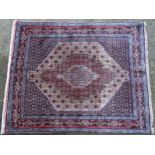 Carpet / Rug : A Senneh Rug, the red, purple and cream ground with central medallion and with