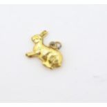 A 9ct gold pendant charm formed as a rabbit. approx 1/2" wide Please Note - we do not make reference