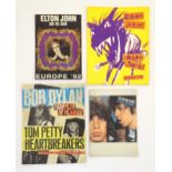 Four late 20thC music / band tour programmes comprising The Rolling Stones, Europe 1976, Elton