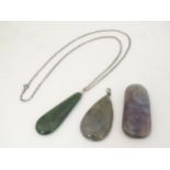 Three various hardstone pendants The largest 2 1/4" long (3) Please Note - we do not make