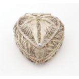 A .925 silver small box of heart shape with filigree decoration. Approx. 1 1/2" x 1 1/2" x 3/4"