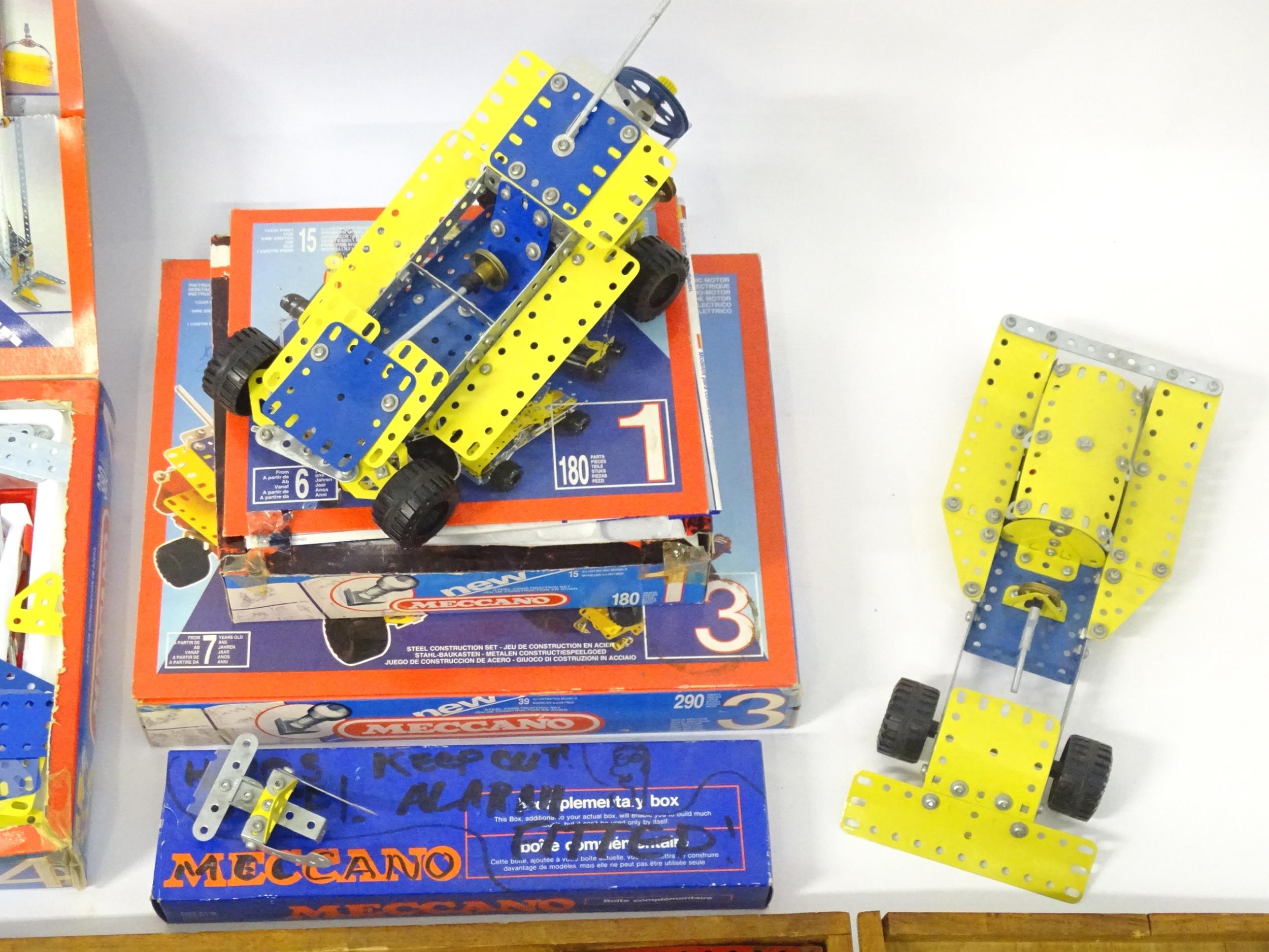 Toys: a large quantity of Meccano, to include cars, helicopter, various wheels, struts, panels - Image 11 of 12