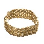 Large bracelet en maille d'or jaune...