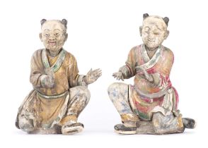 CHINA : Pair of Chinese painted stucco boys, Kangxi period