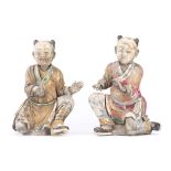 CHINA : Pair of Chinese painted stucco boys, Kangxi period