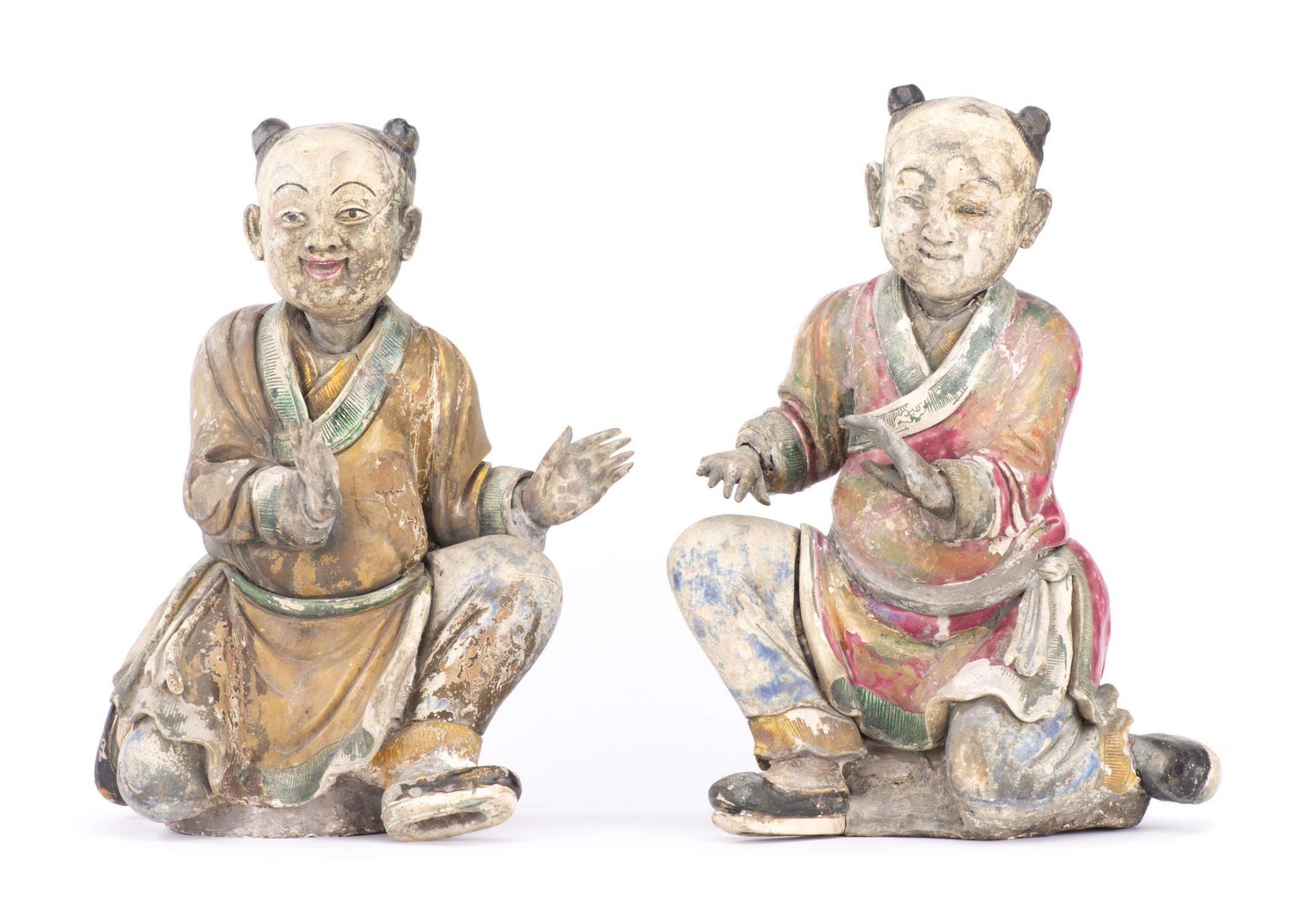 CHINA : Pair of Chinese painted stucco boys, Kangxi period