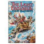 Pratchett (Terry). The Light Fantastic, 1st edition, 1986