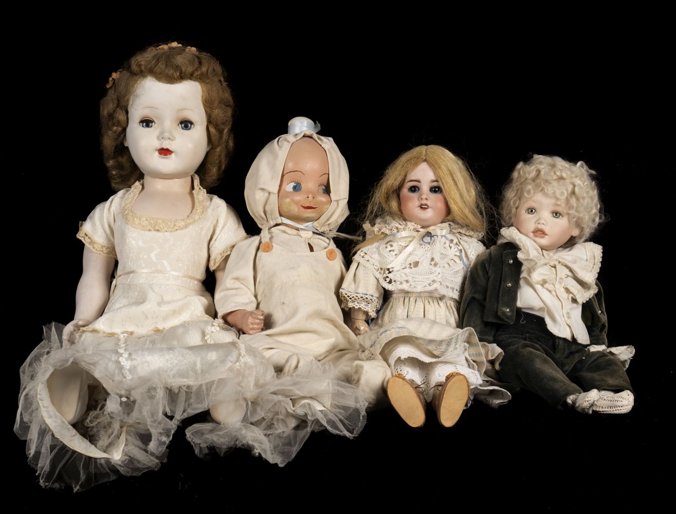 * Dolls. A bisque head doll, French, early 20th century, & 3 others