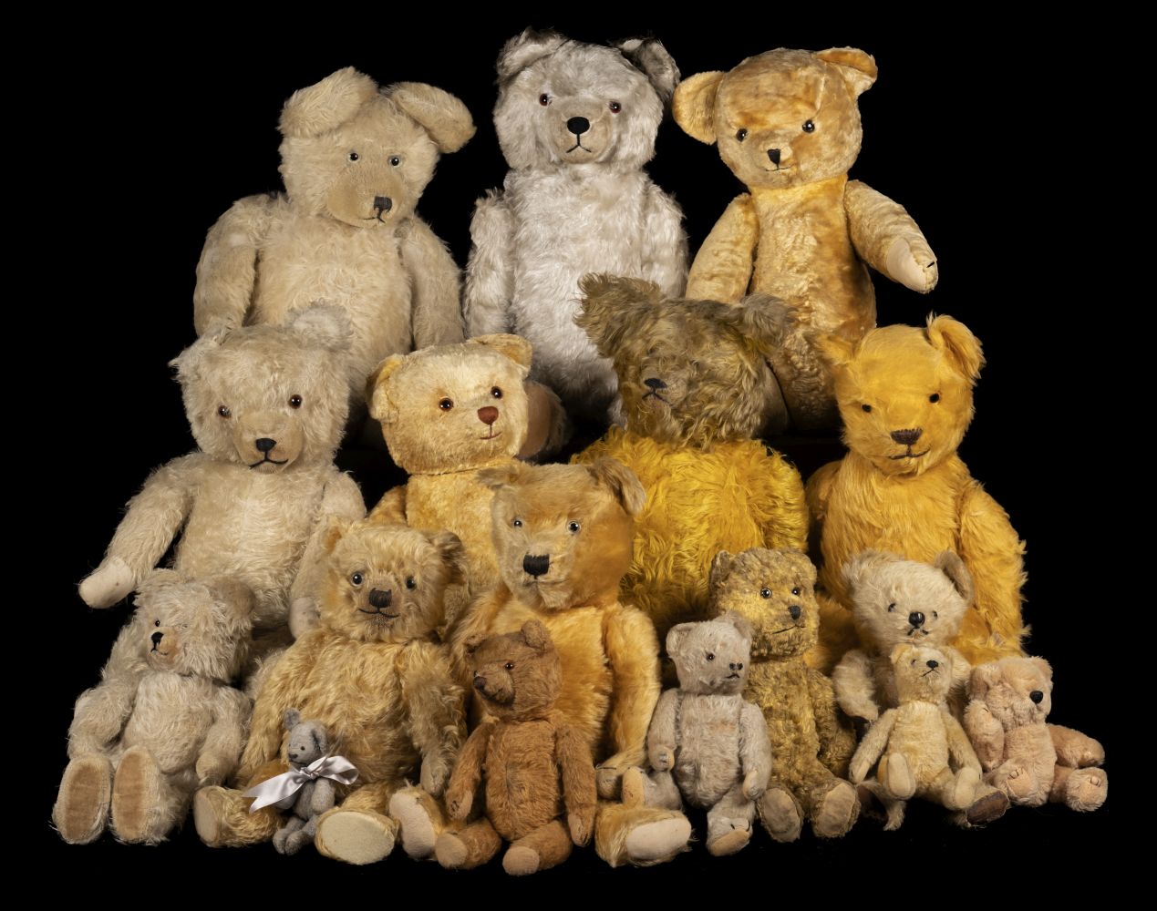 * Teddy Bears. An early teddy bear, probably British, 1930s, & others