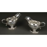 * Sauce Boats. A large pair of George V silver sauceboats