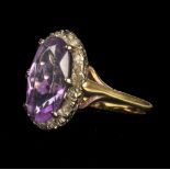 * Ring. 18ct gold amethyst and diamond ring